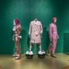 Installation view of Fashioning Masculinities at V&amp;A, featuring looks by Harris Reed, Thom Browne and PRONOUNCE (c) Victoria and Albert Museum, London - Surrealism Beyond Borders at Tate Modern (24 February – 29 August 2022)