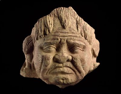 Head of a grimacing yaksha, about 2nd 
or 3rd century